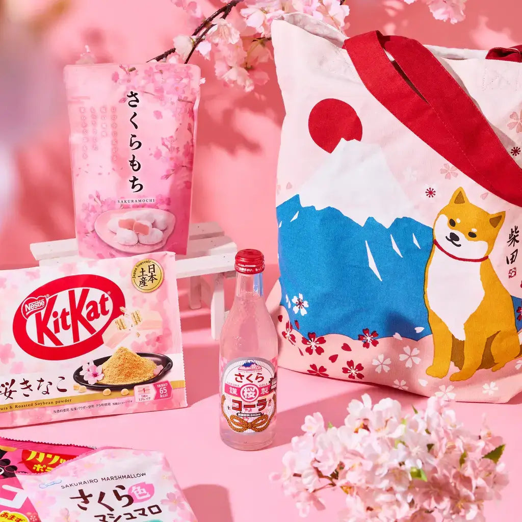 The Sakura Lucky Bag from JapanHaul. It has a Sakura Kinako KitKats, a Shiba Inu tote bag, sakura mochi, and sakura drink. 